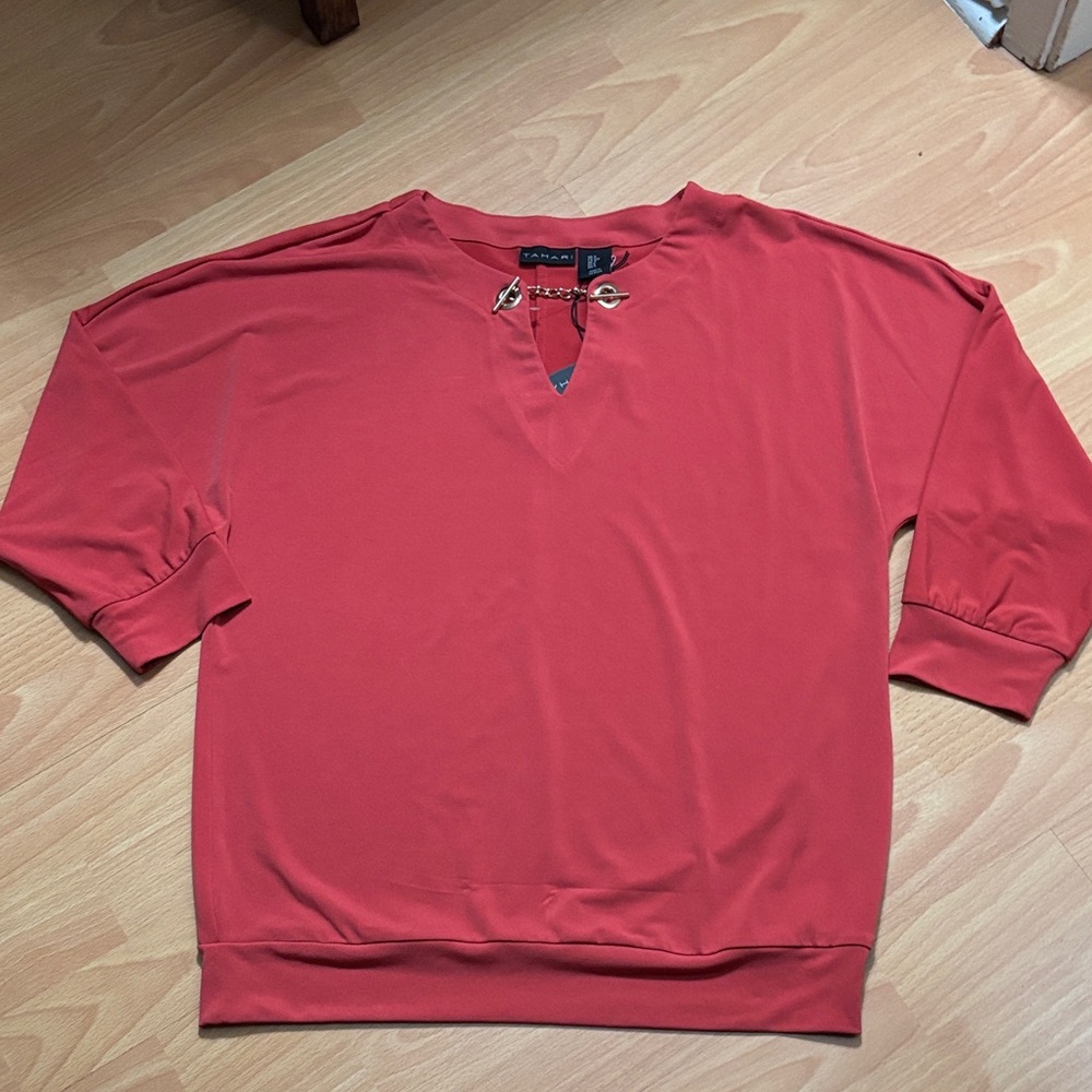 Reddish Orange Tahari women’s blouse with Gold Accents at neck